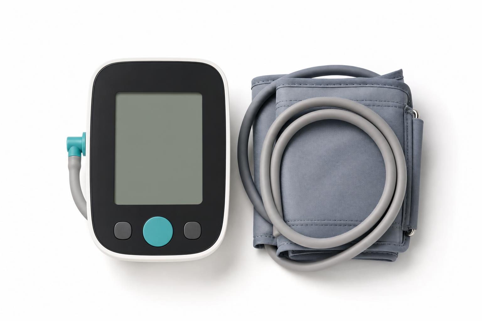 A digital blood pressure monitor with its arm cuff